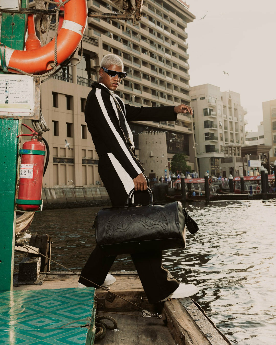 GOLD BRICK DRIP DUFFLE