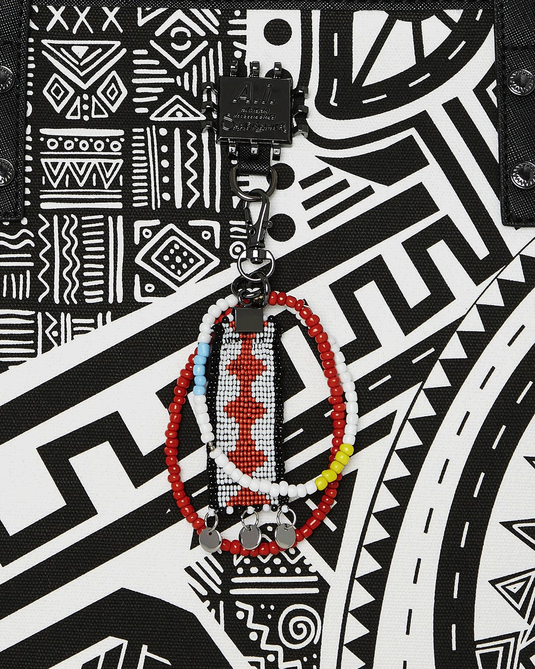 A.I. AFRICAN INTELLIGENCE THE SKYHAWK WING TOTE - SANDFLOWER COLLAB