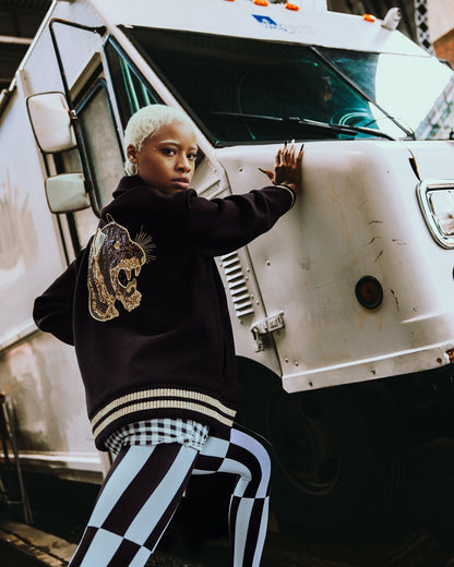 A.I.9 AFRICAN INTELLIGENCE GUILDED LEOPARD - SANDFLOWER COLLAB VARSITY