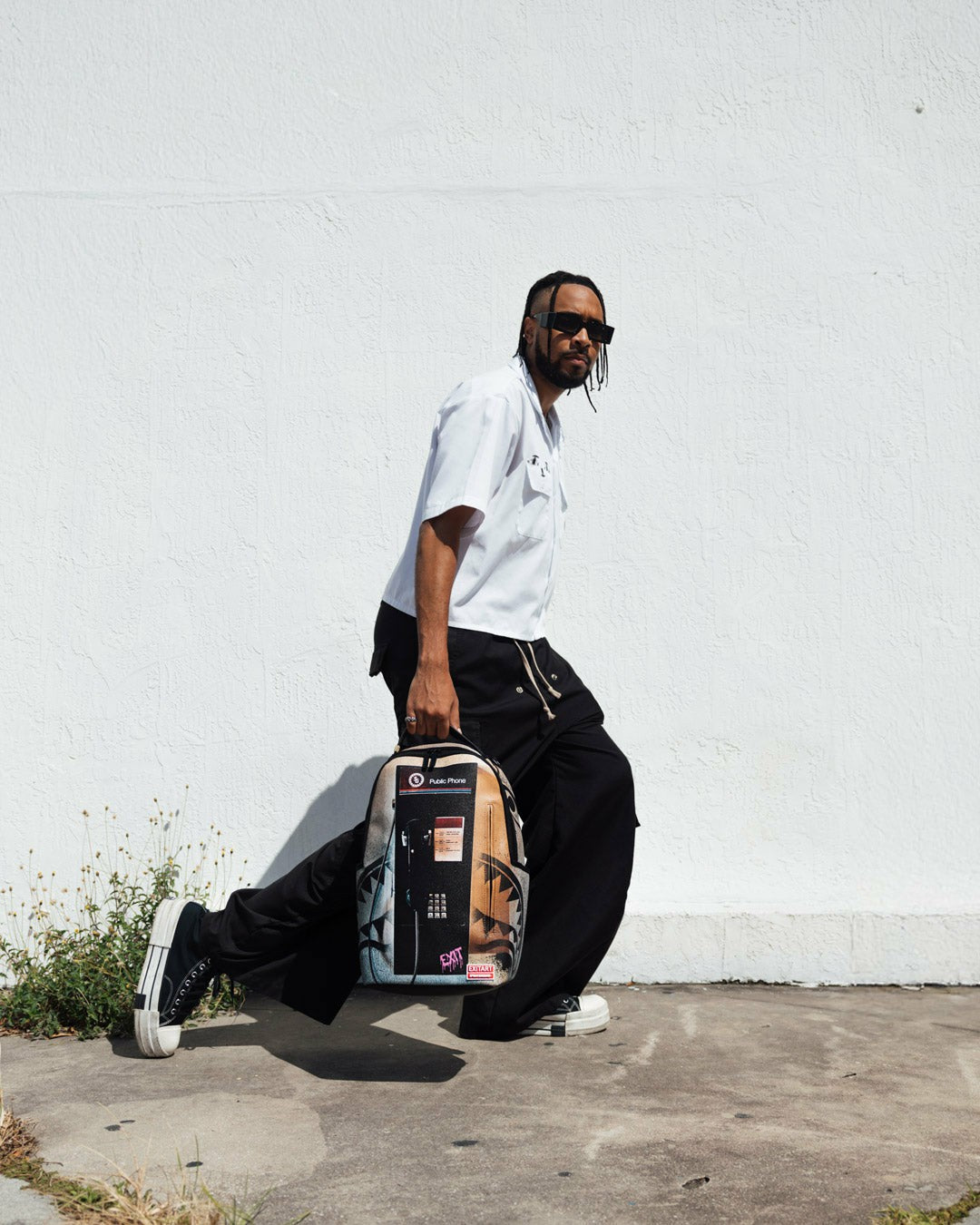 EXIT NYC PAYPHONE BACKPACK