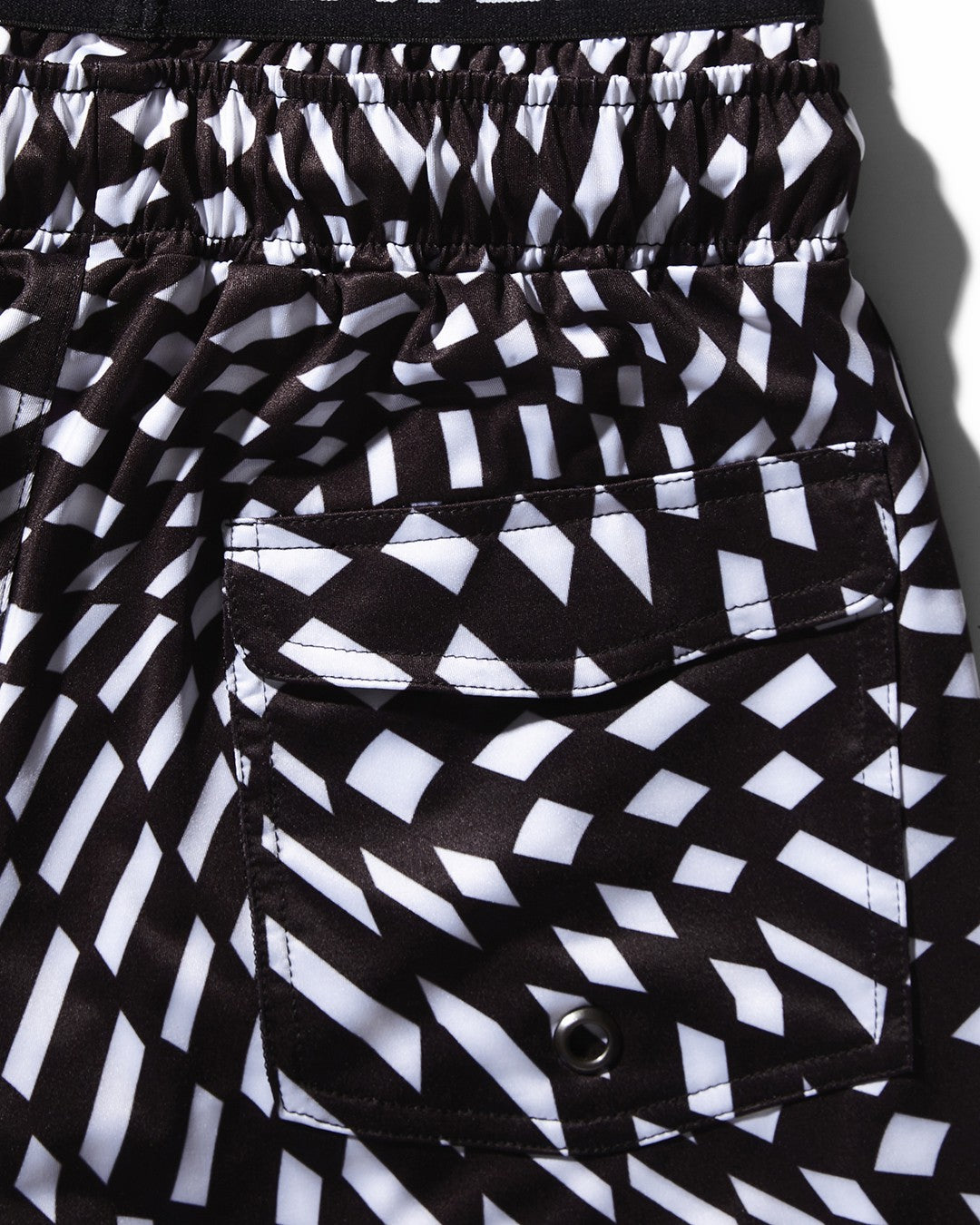 KIDS TRIPPY SWIM TRUNKS