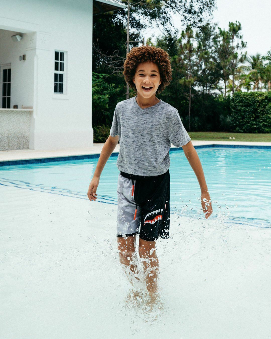 KIDS DAMAGE CONTROL SWIM TRUNKS