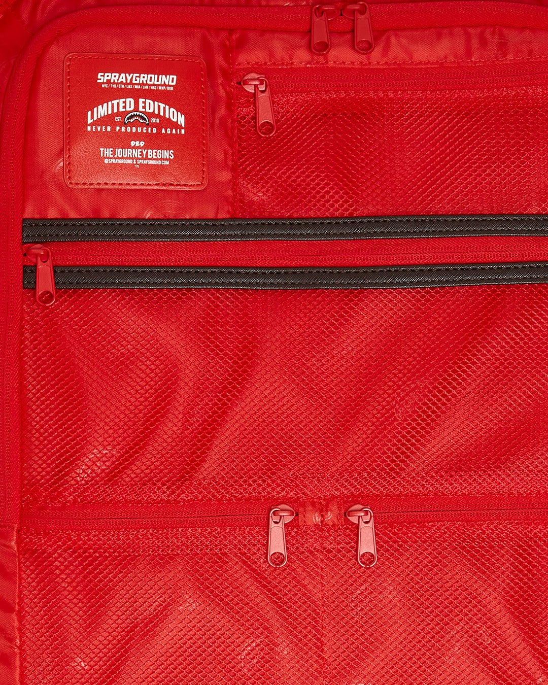 EXTERIOR GOLD ZIP POCKET SHARKS IN PARIS JETSETTER CARRY-ON LUGGAGE