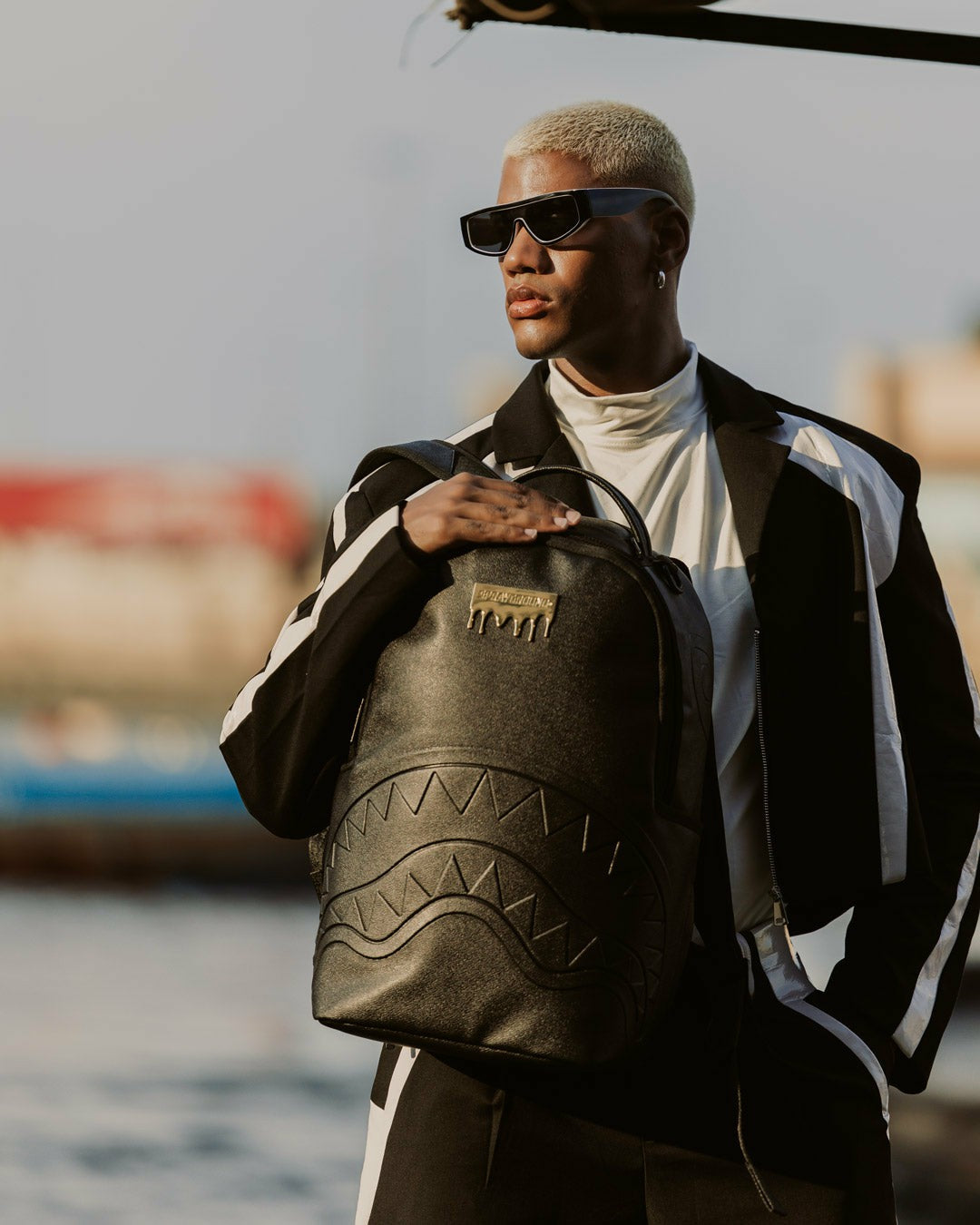 GOLD BRICK DRIP BLACK BACKPACK