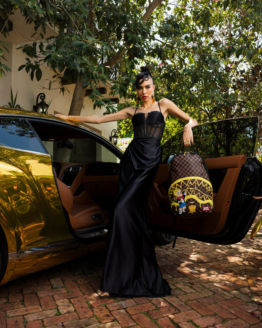 RICHIE RICH PAINT THE SHARK GOLD BACKPACK